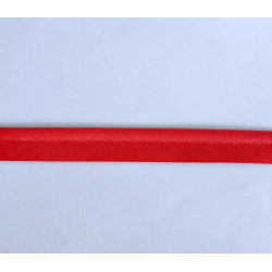 Plain, red flanged piping cord on white background