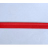 Plain, red flanged piping cord on white background