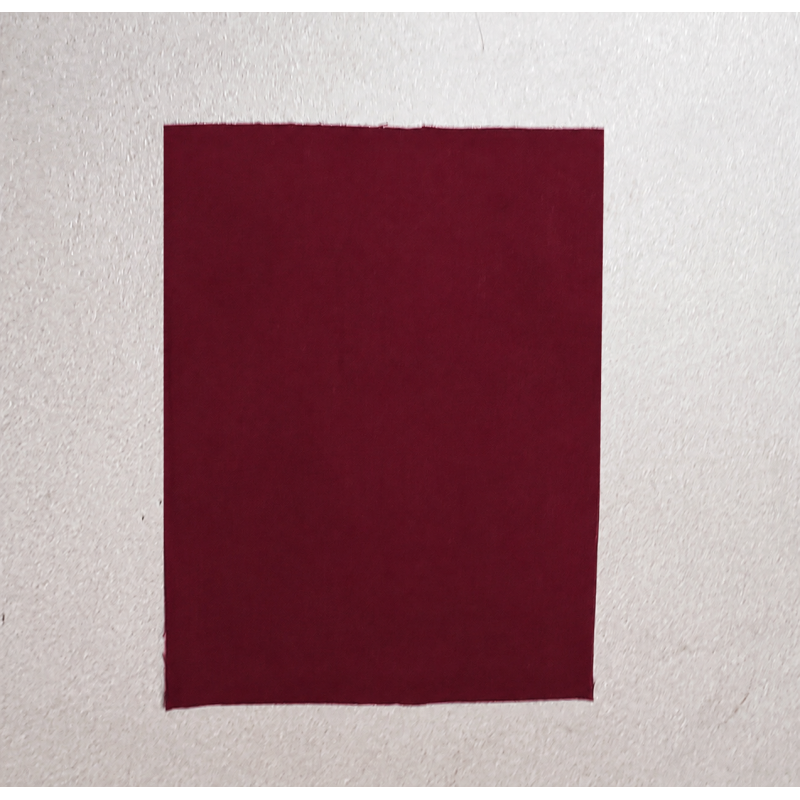 Iron-on - repair fabric - burgundy color, placed on a white background