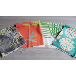 Cotton canvas remnants bundle - tropical designs - 4 pieces, placed on a grey table