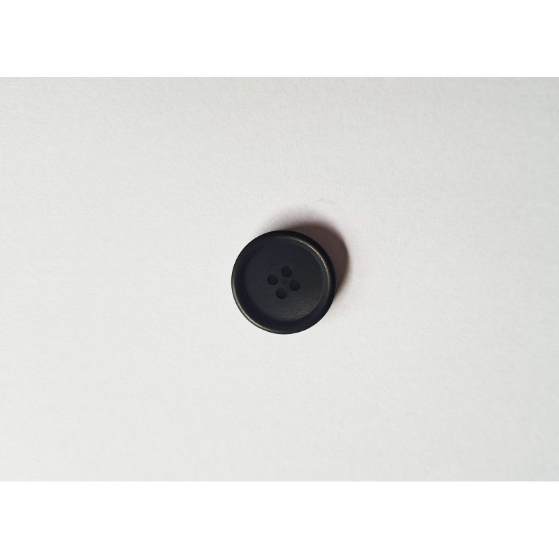 Black button with the rim - 23mm, placed on a white background