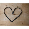 open-ended metal zip antique brass teeth color , single zip on a wooden table