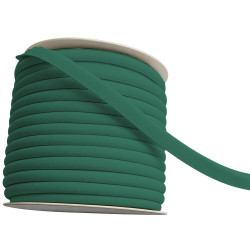 A full reel of plain, fern green flanged piping cord on a white background