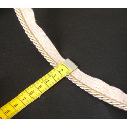 Flanged piping cord  in beige sand  color, 5mm wide piping , capture with the measuring tape