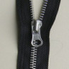 open-ended metal zip nickel teeth color , single zip on white background, closeup