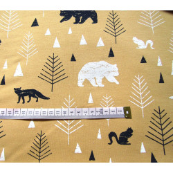 Sweatshirt jersey fabric -  FOREST on mustard background, the pattern with measuring tape