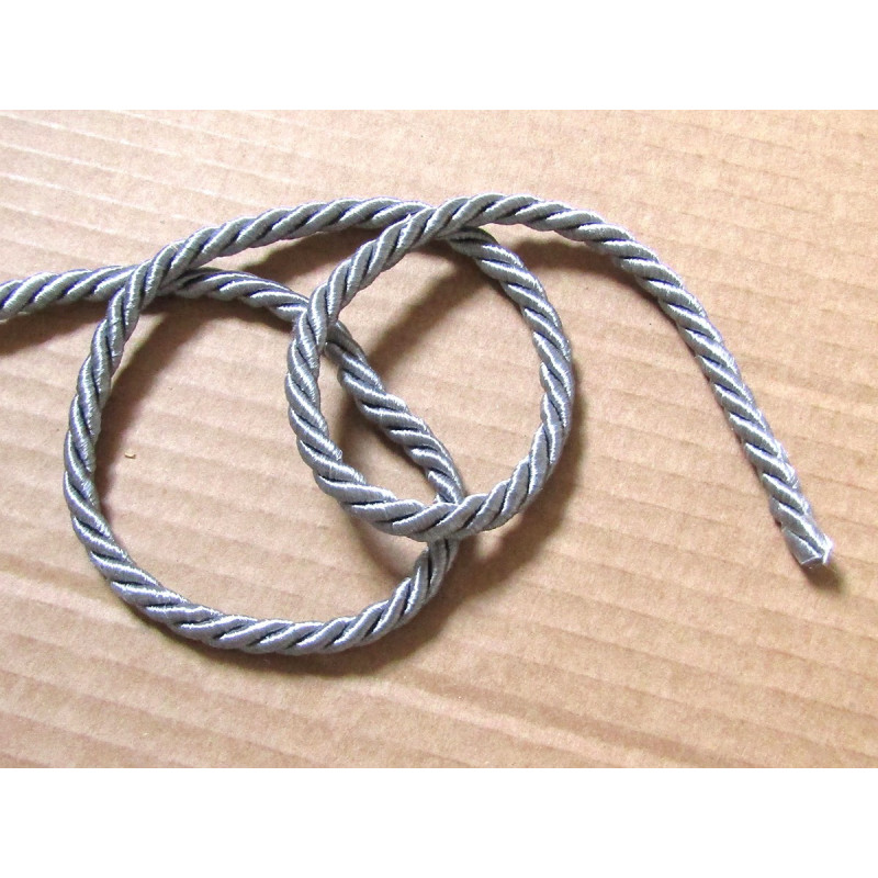 Decorative twisted rope  size 7 in grey color, cord twist on the table