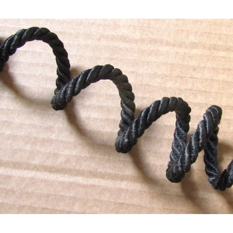 Decorative twisted rope  7mm - black color, on the photo twist of the cord, across the shot