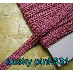 Upholstery braid, 15mm wide  in  dusky pink color, full reel across the table