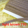 Upholstery braid, 15mm wide  in  light brown color, full reel across the table