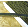 Twisted flanged piping cord 7mm wide in olive color from the reel on a wooden table