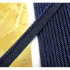 Flanged rope  piping cord 5mm wide, navy color, full reel on the wooden table