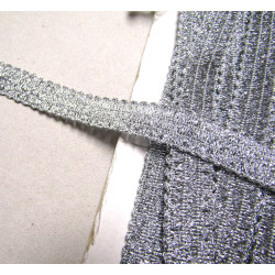 Soft, silver brocade  trim 16 mm wide, paced on the white background