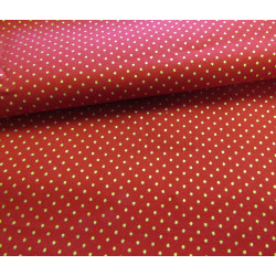 Tiny  gold metallic polka dot on a red background, the capture with the fold
