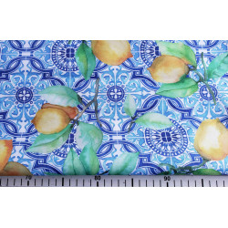 Water- repellent fabric printed with lemons on azulejos tiles in blue&white with measuring tape to show the size of pattern