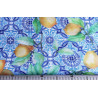 Water- repellent fabric printed with lemons on azulejos tiles in blue&white with measuring tape to show the size of pattern