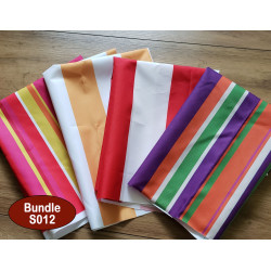 Outdoor fabric remnants bundle - 4 pieces, colorful stripes  mix on the table