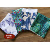 Outdoor fabric remnants bundle - 4 pieces, mix of different patterns placed on the table