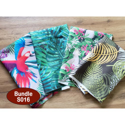 Outdoor fabric remnants bundle - 4 pieces, mix of tropical designs  placed on the table