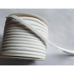 A full reel of plain, white flanged piping cord on white background