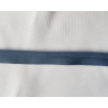 Plain, denim blue flanged piping cord on white background