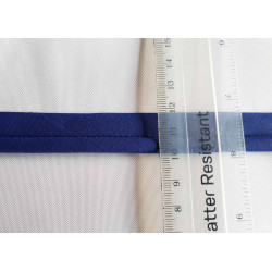 Plain, royal blue flanged piping cord with the ruler on white background