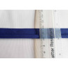 Plain, royal blue flanged piping cord with the ruler on white background