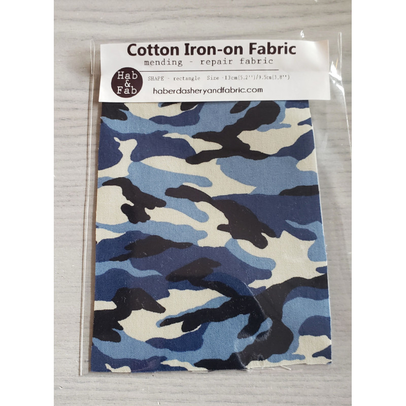 Iron-on repair fabric sheet - camouflage - blue shades, placed on the grey background