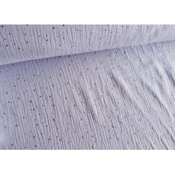 Double gauze fabric with gold speckles - 100% cotton fabric in pale lilac color across the table