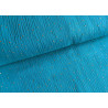 Double gauze fabric with gold speckles - 100% cotton fabric in intense sea blue color across the table