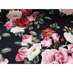 Upholstery velvet printed in Roses bouquets pattern on black background- close up photo