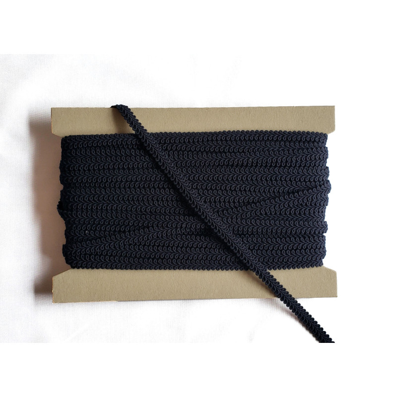 Scroll upholstery braid, 9mm wide  in  black color, full reel on white background