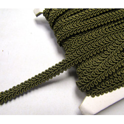 Upholstery braid, 9mm wide  in  olive color, full reel across the table