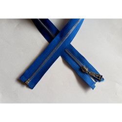 Open-ended plastic zip with a metal look  in royal blue color, 60cm long - nickel, on the white background
