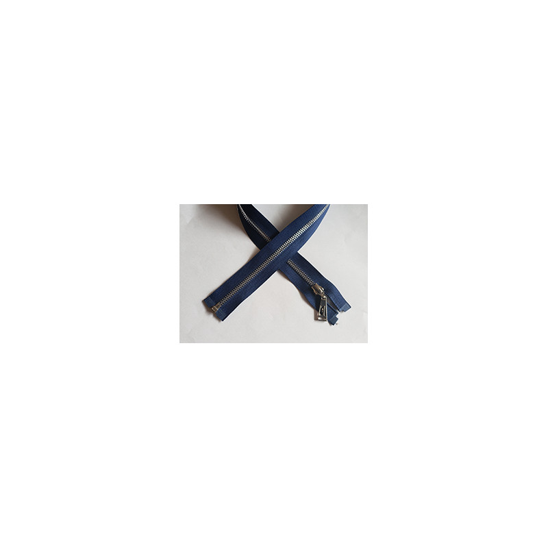 Open-ended plastic zip with a metal look in navy blue color, 60cm long - nickel, on the white background Open-ended plastic zip with a metal look in navy blue color, 60cm long - nickel, on the white background