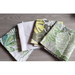 Cotton fabric remnants bundle -heavy panama - tropical prints placed on the table