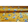 Little Minions on mustard  - medium cotton fabric, the capture with the fold