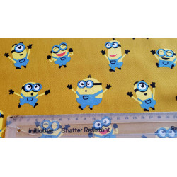 Little Minions on mustard - medium cotton fabric, the capture with measuring tape