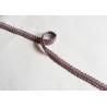 Silky gimp braid 9mm - scroll - heather color, twisted on the white background