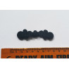 Chinese frog fastener in black color on a white background with the ruler