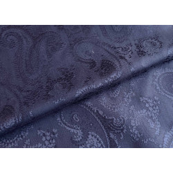 Two-sided Silk jacquard  in navy color, the capture of fabric with the fold across the image