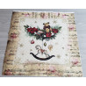 Christmas cushion panel- Rocking horse theme, placed on grey table