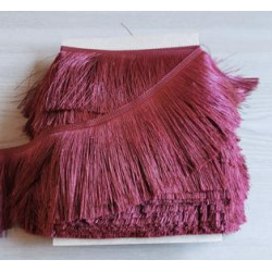 Silky cut fringe - burgundy - 110mm long, full reel on the table