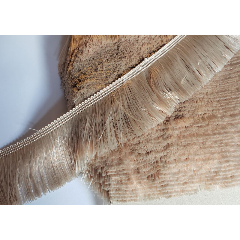 silky cut fringe - beige sand color - 60mm long on a white background