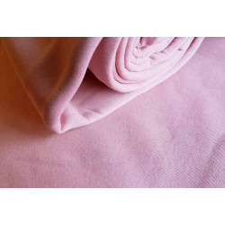 Sweatshirt jersey fabric - blush pink, the photo shows the roll of the fabric