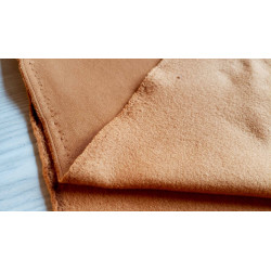 Sweatshirt jersey fabric - dark mustard color, the photo shows both sides of the fabric