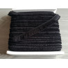 Short cotton fringe 3cm - black, full reel placed on the table-