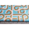 Twisted_paths_ turquoise - Water-resistant canvas fabric, placed on the table with the ruler