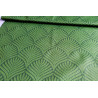 Water-resistant canvas fabric - Fern Damask, the fabric on the roll with the fold across the shot