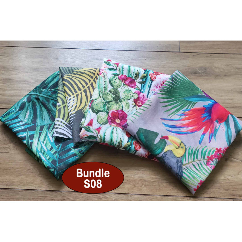 Outdoor fabric remnants bundle, 4 pieces of fabric, printed in parrots design placed on the table